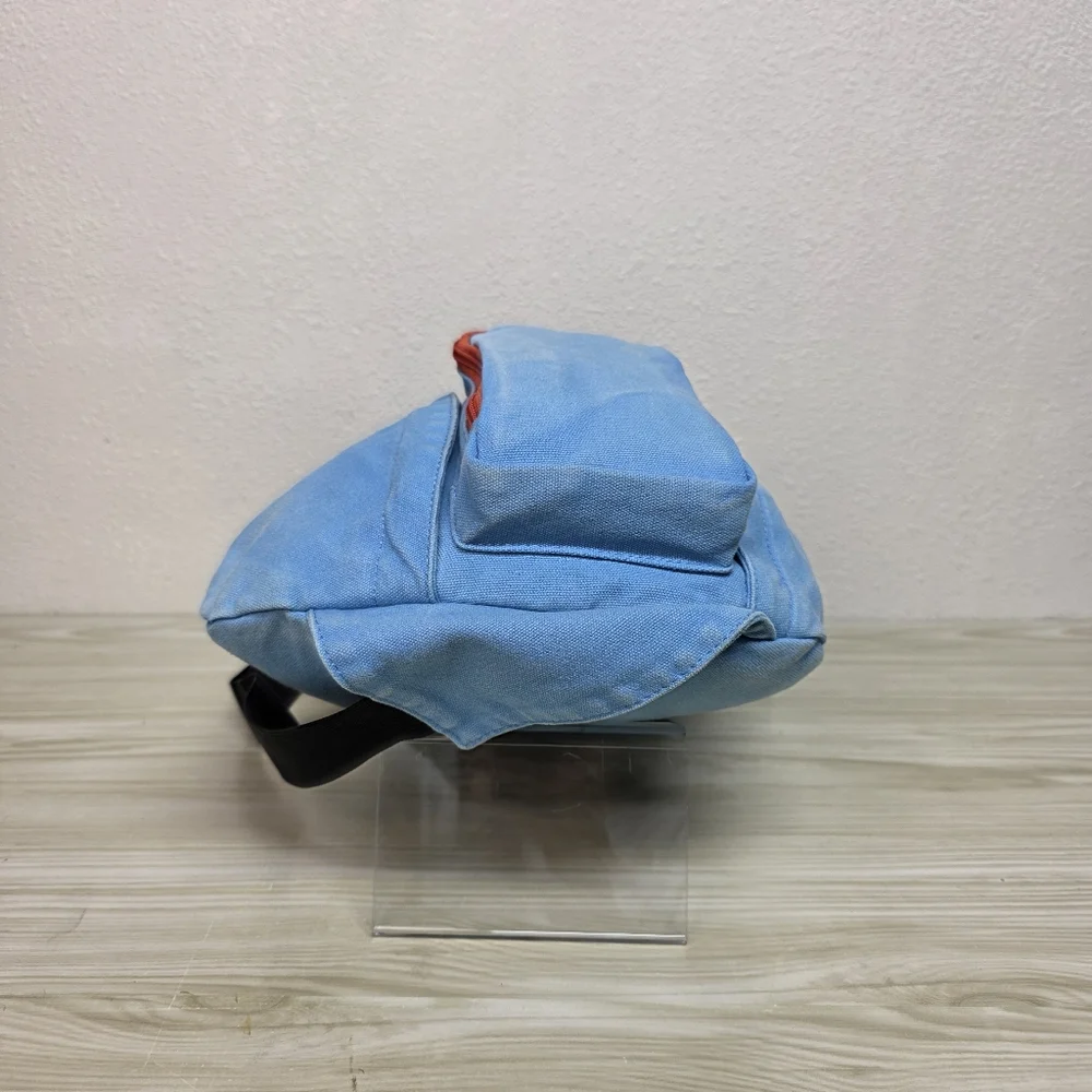 KAVU Denim Blue Sling Backpack with Orange Accents, Adjustable Rope Strap